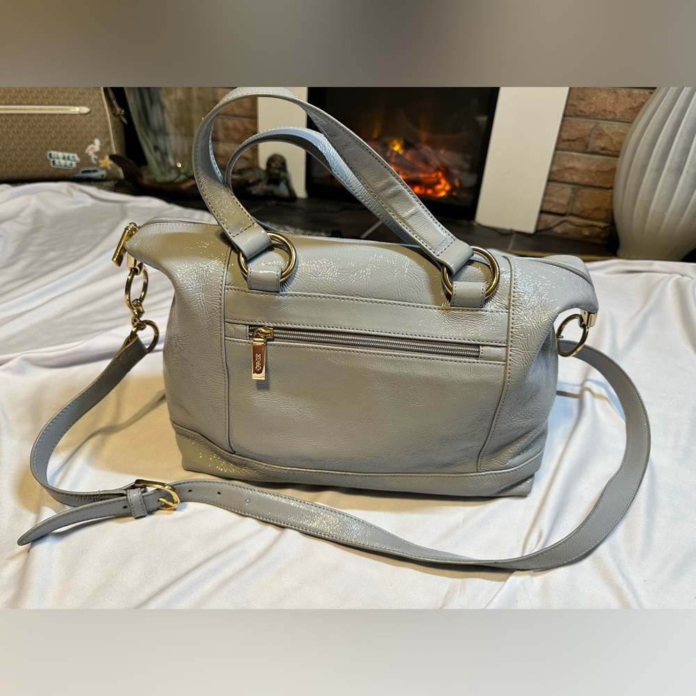 HOBO brand patented leather beautiful bag. Cross body strap.  EUC. No odors.